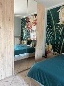 Postel nebo postele na pokoji v ubytování Urban Oasis Ovada