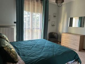 Postel nebo postele na pokoji v ubytování Urban Oasis Ovada