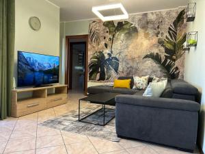 TV a/nebo společenská místnost v ubytování Urban Oasis Ovada