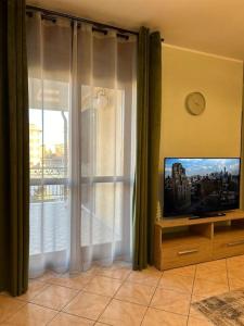 TV a/nebo společenská místnost v ubytování Urban Oasis Ovada