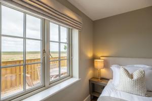 Postel nebo postele na pokoji v ubytování Garden Cottage Brancaster