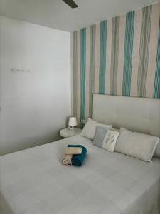 Postel nebo postele na pokoji v ubytování BUNGALOW BEACH&RELAX