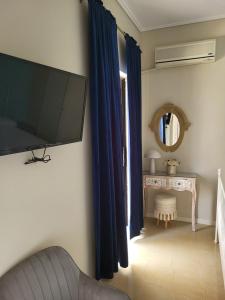 TV a/nebo společenská místnost v ubytování Margarita rooms
