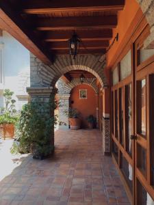 an entrance to a building with an archway at Hotel Socavon in Guanajuato +48 photos