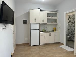 Kuchyň nebo kuchyňský kout v ubytování Villa Almando