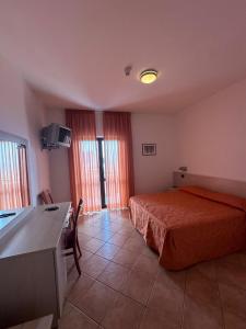 Postel nebo postele na pokoji v ubytování Athena Palace Hotel