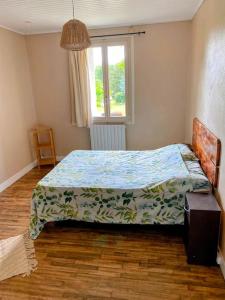 Katil atau katil-katil dalam bilik di Charming house in quiet village