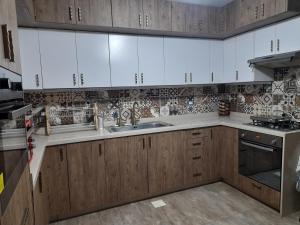 Køkken eller tekøkken på Alfred's guest House room 3