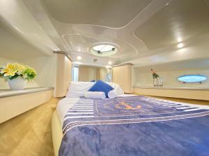 a large bed in the middle of a boat at The Valencia Yacht Experience in Valencia +36 photos
