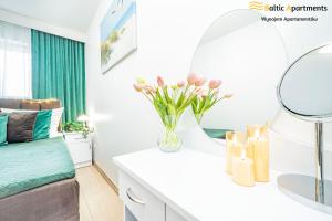 Łóżko lub łóżka w pokoju w obiekcie Baltic Apartments - Sun Towers