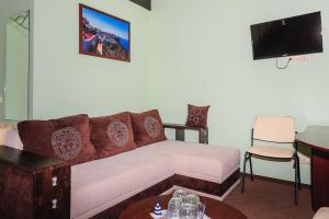 TV a/nebo společenská místnost v ubytování Terminal-A Hotel