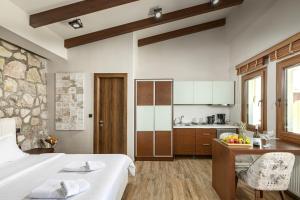 Kuchyň nebo kuchyňský kout v ubytování Vintage Suites Trikala