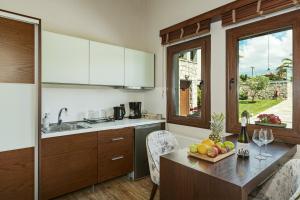 Kuchyň nebo kuchyňský kout v ubytování Vintage Suites Trikala