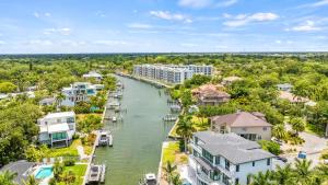 an aerial view of a river with houses and condos at Waterfront, Pet-Friendly Condo with Pool, Spa, and Fitness Center near Downtown Sarasota in Sarasota