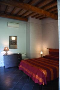 Кровать или кровати в номере Vigna Di Valle