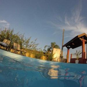 a close up of a swimming pool at Pousada 4 Estações itapoa in Itapoa
