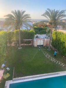 Lovely Villa 5- bedroom with Overflow Pool with Nice Garden at Green Oasis Resort