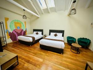 Postel nebo postele na pokoji v ubytování Way Kap Hostel Cusco