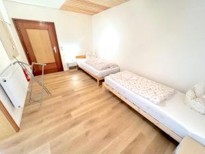 Postel nebo postele na pokoji v ubytování I Apartment 2 Personen - Monteurwohnung - Ferienwohnung Griesbach I