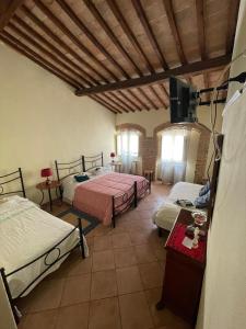 Postel nebo postele na pokoji v ubytování LA STREGA UBRIACA + 10 fotografií