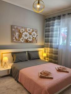 Postel nebo postele na pokoji v ubytování Savvas Luxury Apartment