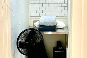 a fan sitting on a shelf in a room at Durango Tango in Durango +25 photos