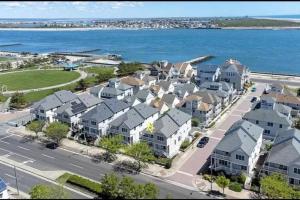 an aerial view of houses in front of the ocean at Seaside Serenity AC- newly updated Ocean View Home -3 bed 2 bath in Atlantic City