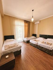 Letto o letti in una camera di Sofia House