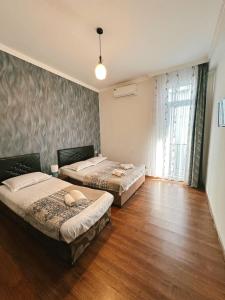 Letto o letti in una camera di Sofia House