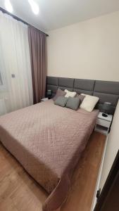 Postel nebo postele na pokoji v ubytování Wisła apartament przy stoku