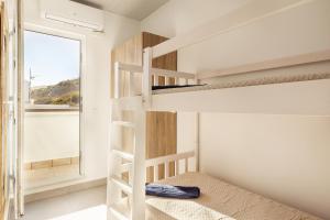 Ένα ή περισσότερα κρεβάτια σε δωμάτιο στο Casa Miramar