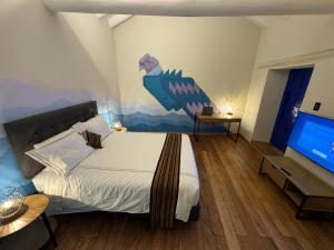Postel nebo postele na pokoji v ubytování Way Kap Hostel Cusco