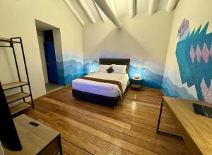 Postel nebo postele na pokoji v ubytování Way Kap Hostel Cusco