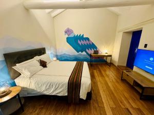 Postel nebo postele na pokoji v ubytování Way Kap Hostel Cusco