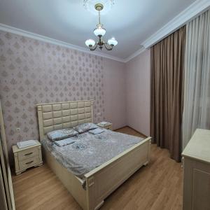 Postel nebo postele na pokoji v ubytování Apartment Cozy House 1