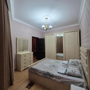 Postel nebo postele na pokoji v ubytování Apartment Cozy House 1