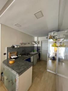 Η κουζίνα ή μικρή κουζίνα στο Résidence miramar beach