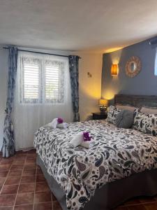 Postel nebo postele na pokoji v ubytování Vivienda vacacional El Lagarto