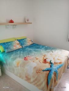 Posteľ alebo postele v izbe v ubytovaní Sol y Mar Puerto Paraiso