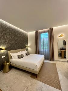 Postel nebo postele na pokoji v ubytování Elegant Rooms