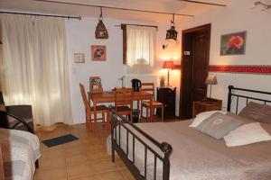 Postel nebo postele na pokoji v ubytování B&B Ferme du Petit Breuil