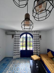 Postel nebo postele na pokoji v ubytování Dmina House