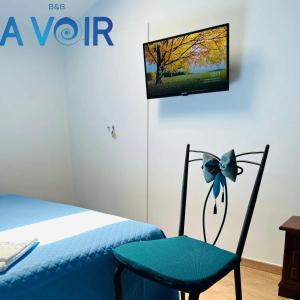 TV a/nebo společenská místnost v ubytování B&B A Voir + 8 fotografií