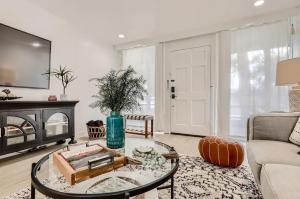 a living room with a couch and a table at Luxury Condo In Old Town Scottsdale Wpool in Scottsdale