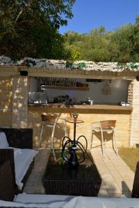 Balcone o terrazza di Doliva Studio John private jacuzzi