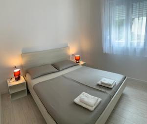 Łóżko lub łóżka w pokoju w obiekcie The48