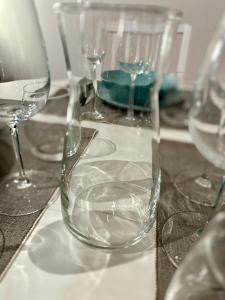 a group of wine glasses sitting on a table at Apartamento St Agustí - Centric in Mataró
