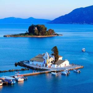 a small island in the middle of a large body of water at Adelia's Luxury Studio in Corfu in Corfu