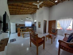 a living room with a couch and chairs and a table at Casa Sol in Prado