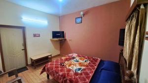 Postel nebo postele na pokoji v ubytování SoNa holidays Inn
